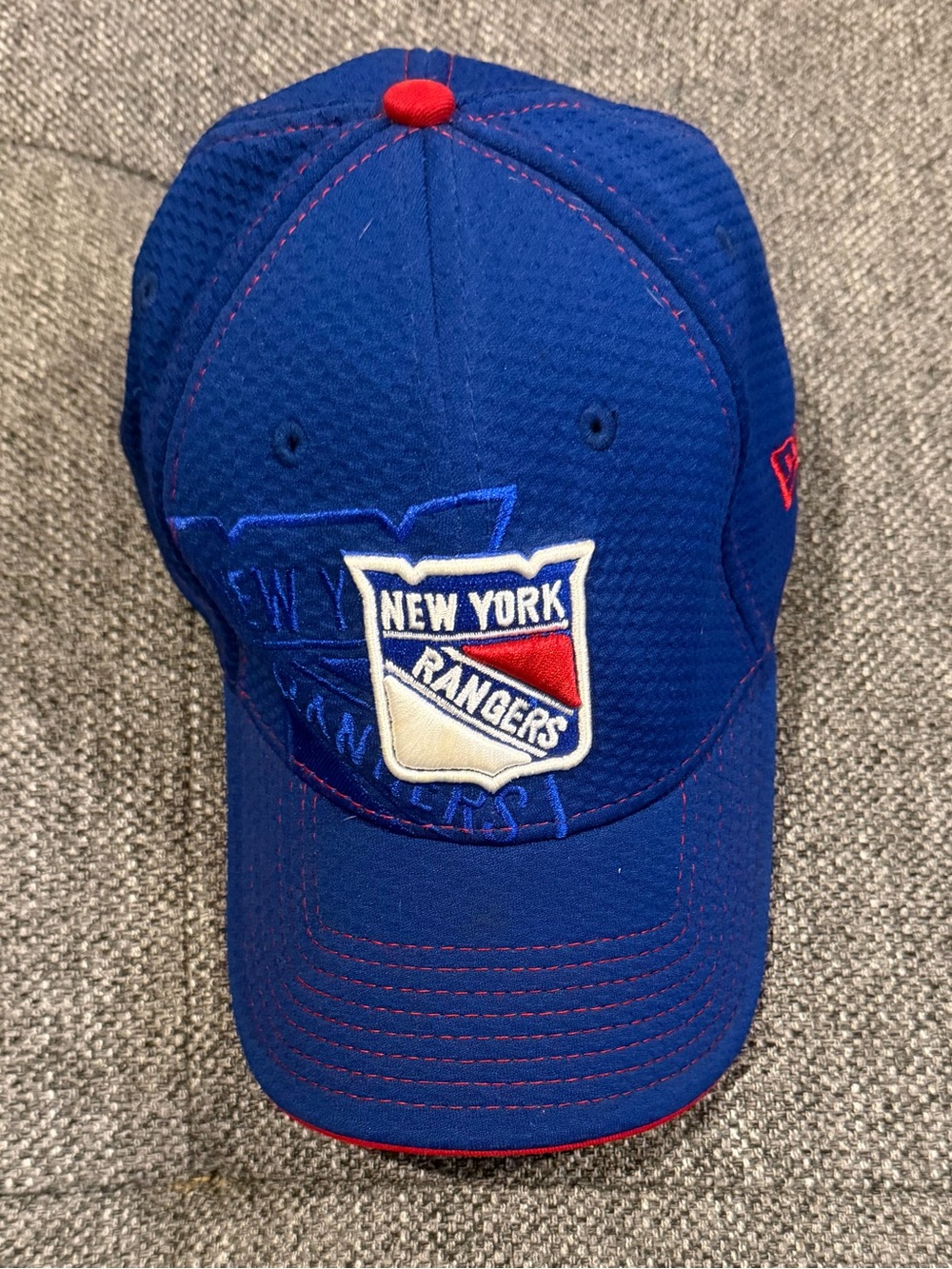 Hat on gray surface